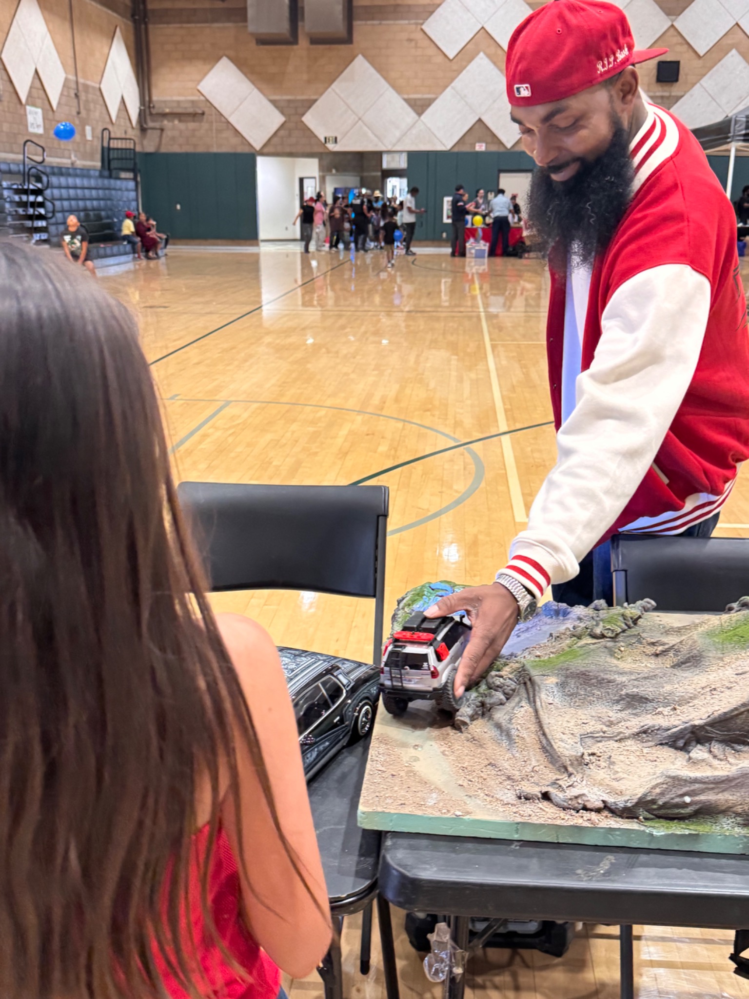 Mike demonstrating an RC vehicle on a rock-crawling course